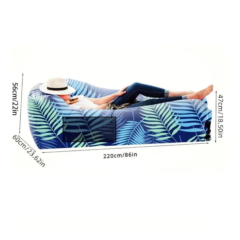 Inflatable lounge chair with leaf pattern and dimensions displayed