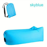 Load image into Gallery viewer, Inflatable sky blue lounge with carrying bag on a white background
