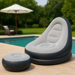 Load image into Gallery viewer, Inflatable chair and ottoman by a poolside with an umbrella in the background
