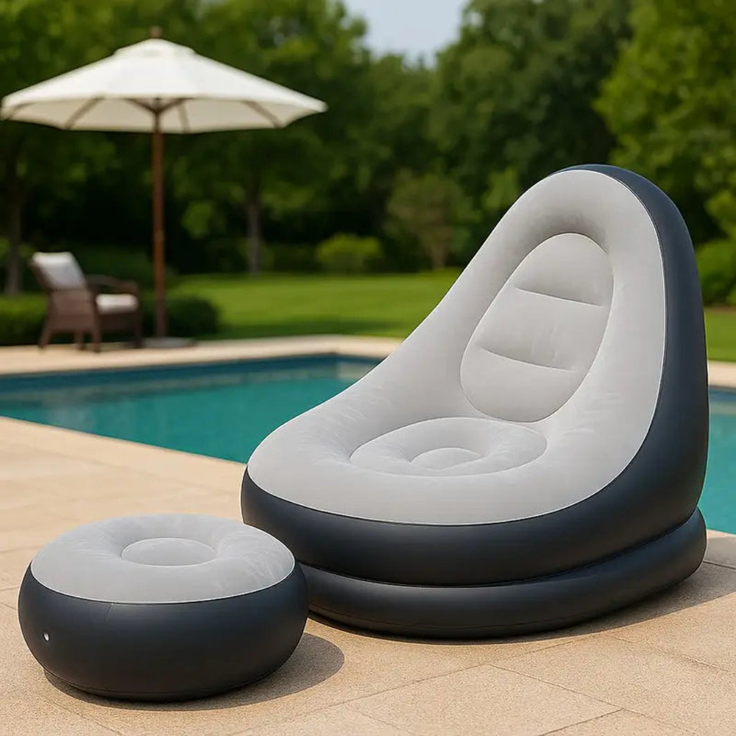 Inflatable chair and ottoman by a poolside with an umbrella in the background